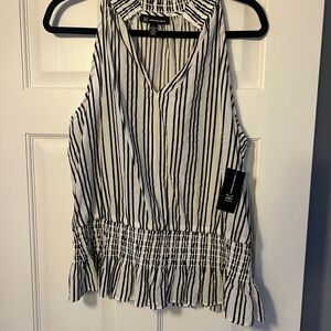 This is a brand new INC dressy tank top size large!